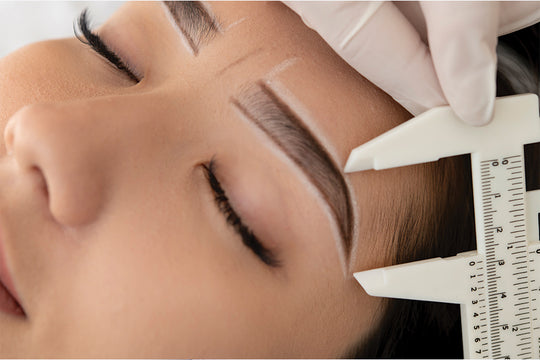 A woman performing brow lamination | how long does brow lamination last